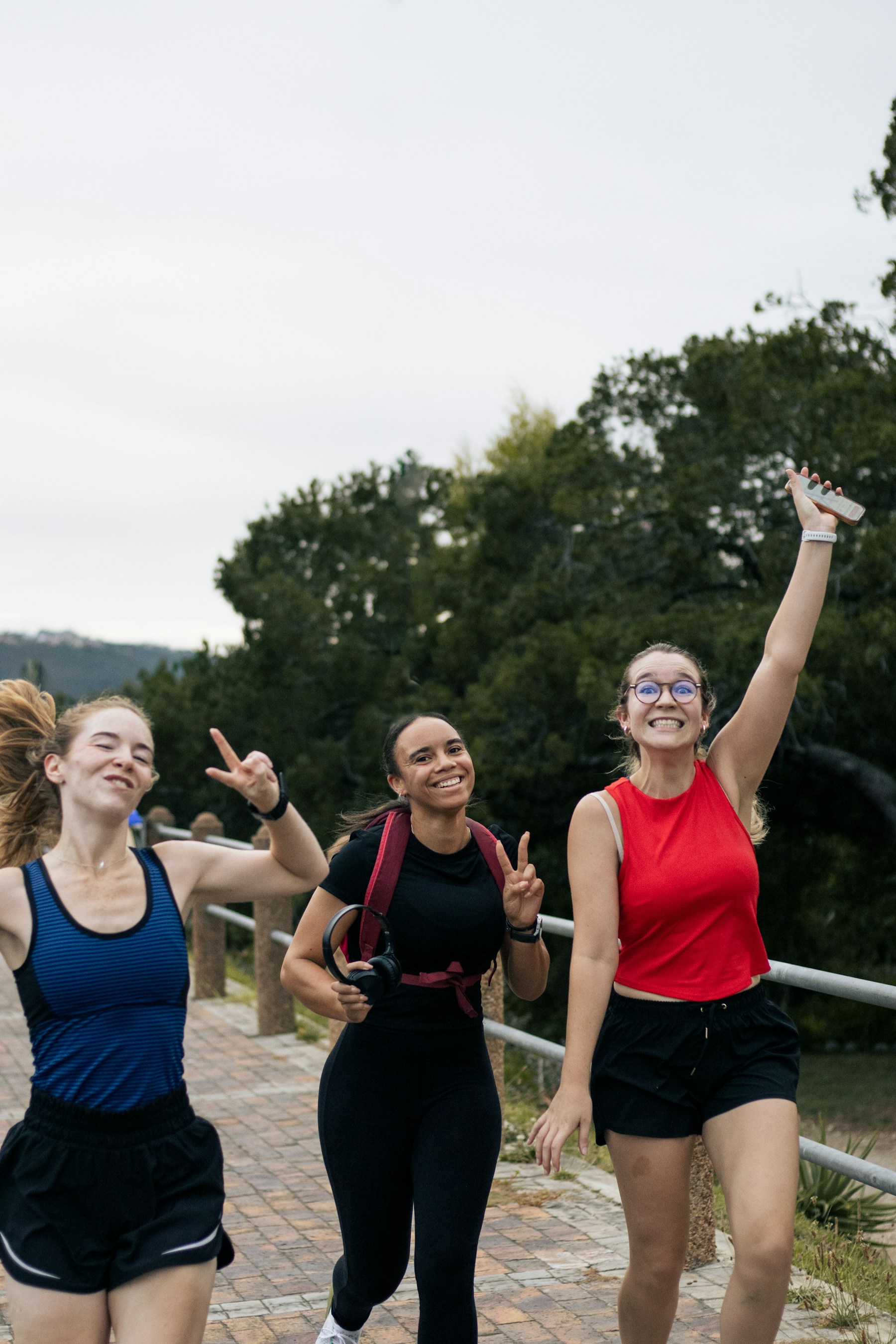 Friends celebrating after a fitness challenge